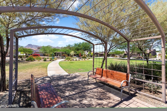 20684 W Meadowbrook Ave, Buckeye, AZ 85396 - view of home's community with a yard and a mountain view