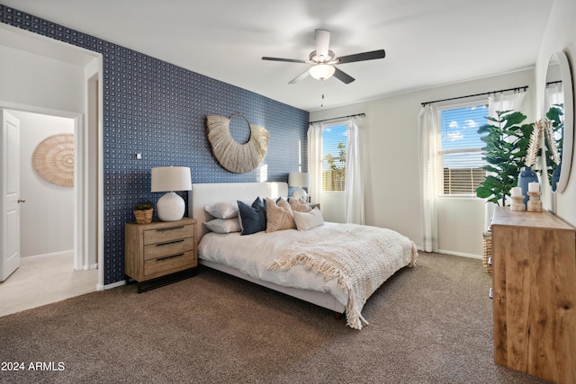 carpeted bedroom featuring ceiling fan