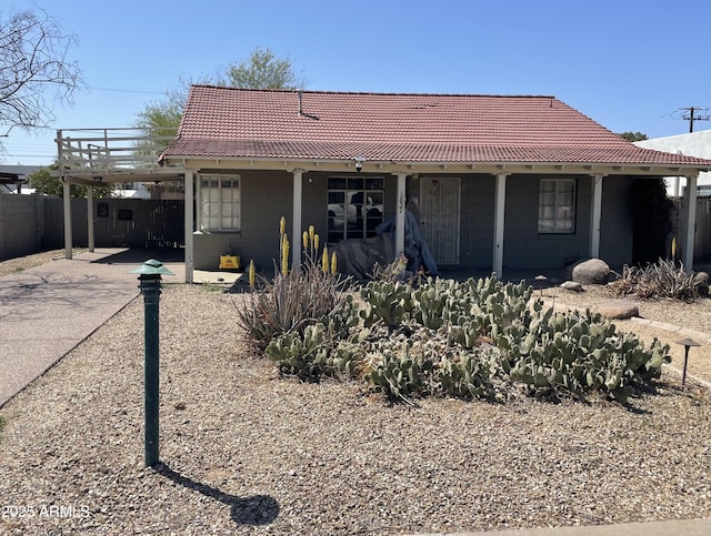 1837 W Roma Ave, Phoenix, AZ 85015 - ranch-style house featuring a carport, a tile roof, fence, and driveway
