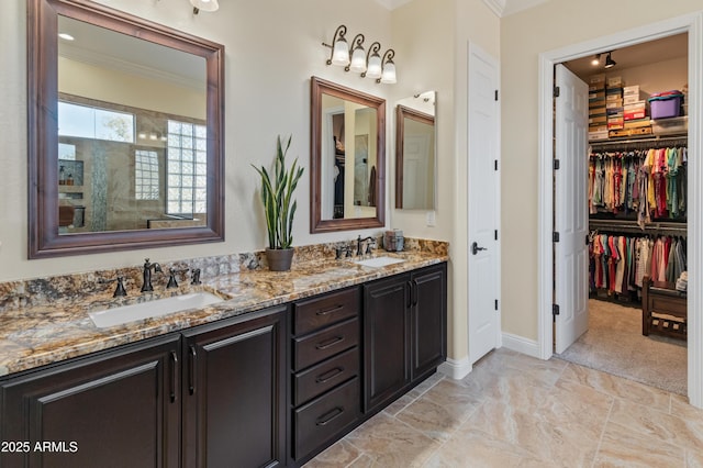 bathroom featuring vanity and ornamental molding