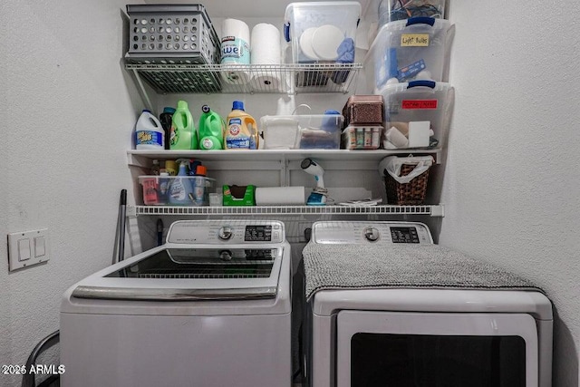 laundry area featuring washing machine and dryer