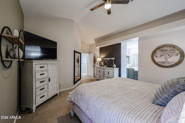 bedroom featuring ceiling fan, connected bathroom, light colored carpet, and lofted ceiling