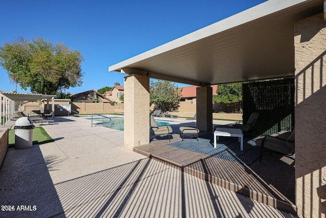 view of patio / terrace featuring a fenced in pool and a pergola