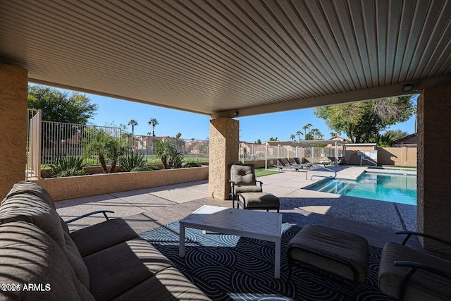 view of patio / terrace with a fenced in pool and a pergola