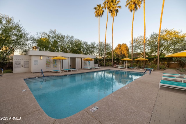 view of swimming pool featuring a patio area