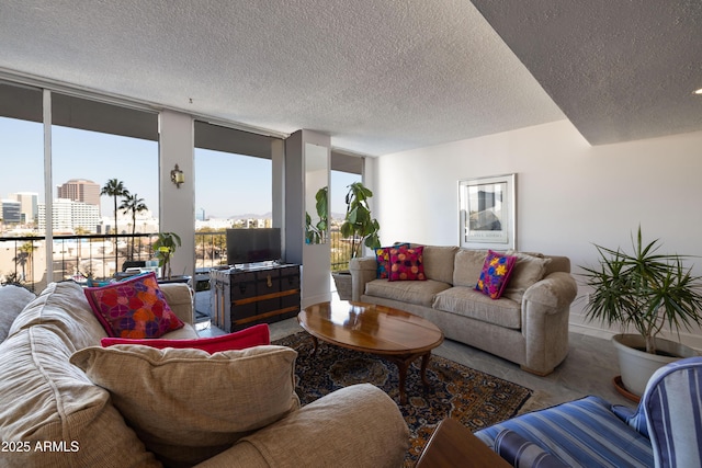 living room featuring a wall of windows and a textured ceiling