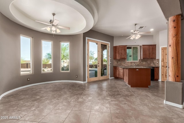 5347 E 10th Ave, Apache Junction, AZ 85119 - kitchen featuring a ceiling fan, tasteful backsplash, french doors, open floor plan, and recessed lighting