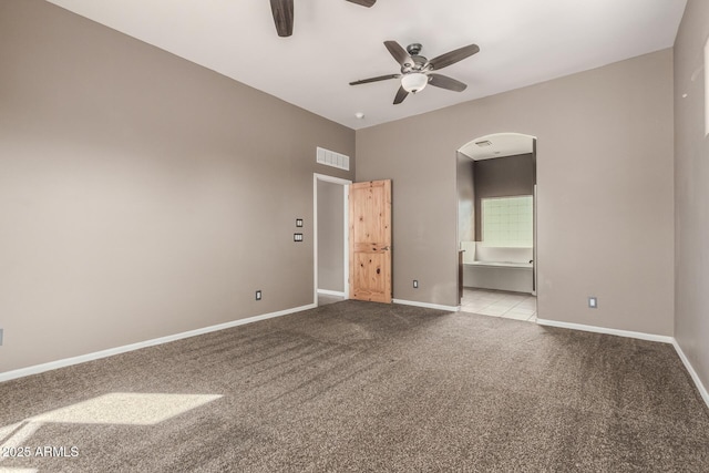 5347 E 10th Ave, Apache Junction, AZ 85119 - carpeted spare room featuring ceiling fan and arched walkways