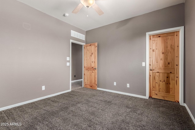 5347 E 10th Ave, Apache Junction, AZ 85119 - unfurnished bedroom featuring carpet floors and ceiling fan