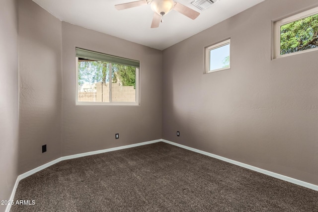 5347 E 10th Ave, Apache Junction, AZ 85119 - spare room with dark colored carpet and a ceiling fan