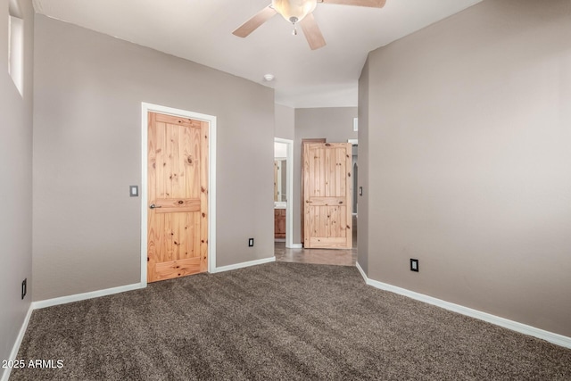 5347 E 10th Ave, Apache Junction, AZ 85119 - unfurnished bedroom with dark colored carpet, ensuite bath, and ceiling fan