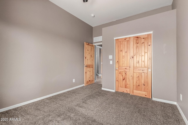 5347 E 10th Ave, Apache Junction, AZ 85119 - unfurnished bedroom with carpet and baseboards