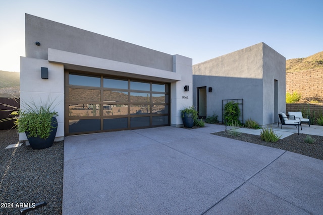 contemporary house with a patio area