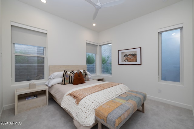 carpeted bedroom with ceiling fan