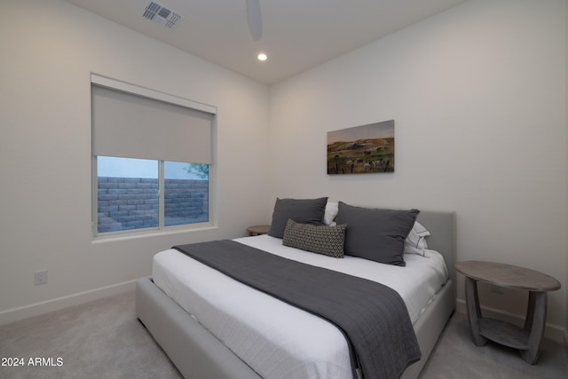 carpeted bedroom with ceiling fan