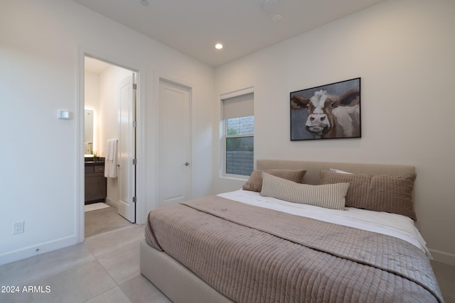 tiled bedroom with ensuite bathroom