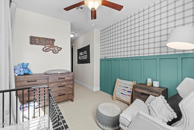 bedroom featuring ceiling fan and light colored carpet