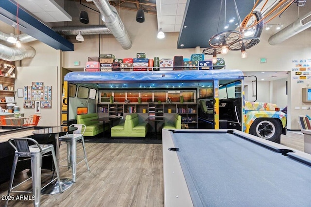 recreation room featuring pool table and hardwood / wood-style floors