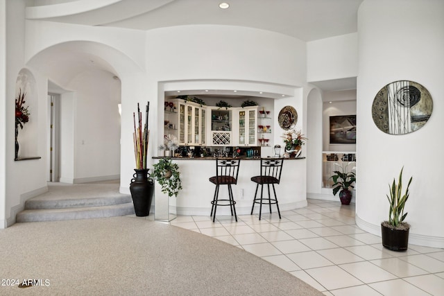 kitchen featuring light tile patterned flooring