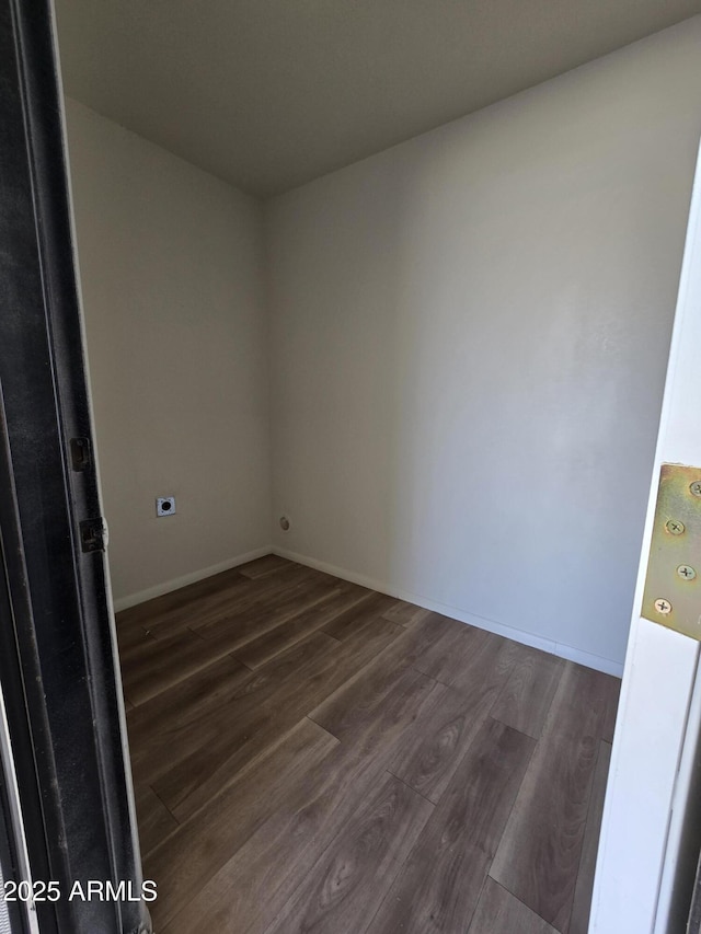 empty room with dark hardwood / wood-style floors