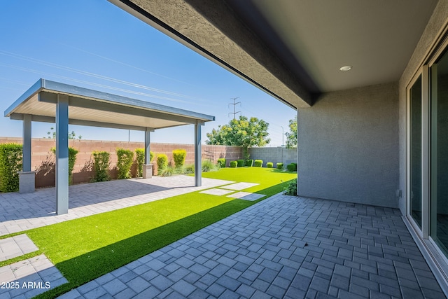 view of patio with a fenced backyard