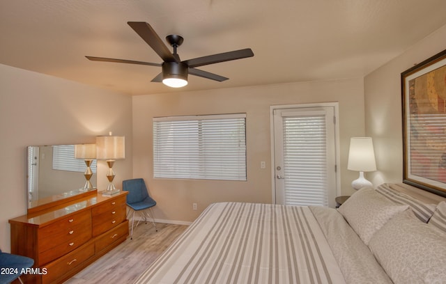 bedroom featuring ceiling fan and light wood-type flooring