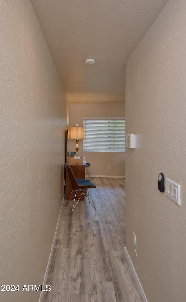 hall featuring light hardwood / wood-style flooring