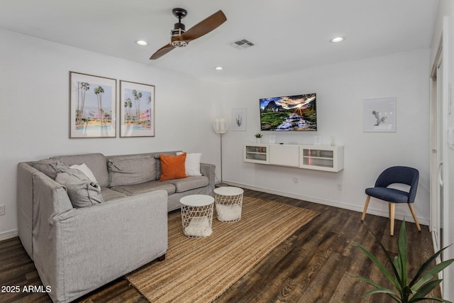 living room with dark wood-type flooring, recessed lighting, visible vents, and baseboards