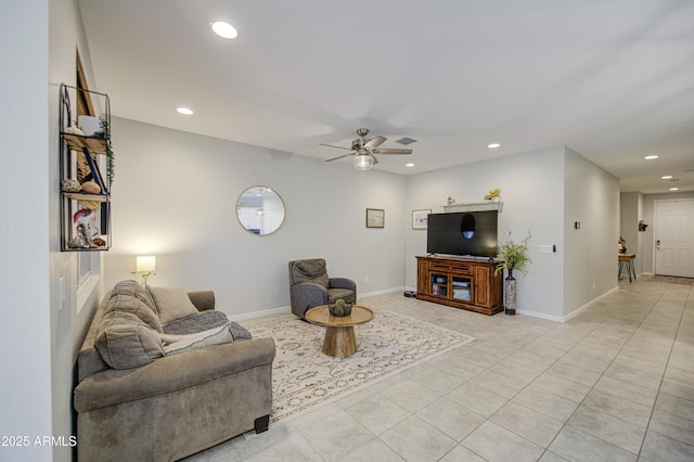 living area featuring baseboards, recessed lighting, a ceiling fan, light tile patterned flooring, and visible vents