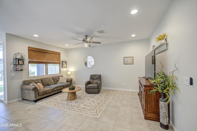 living room with baseboards, recessed lighting, light tile patterned floors, visible vents, and ceiling fan