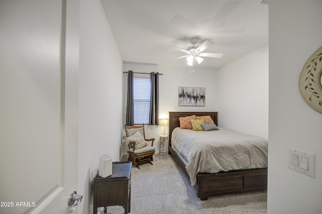 carpeted bedroom with a ceiling fan