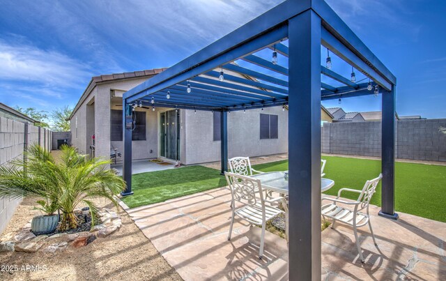 view of patio / terrace with outdoor dining space and a fenced backyard
