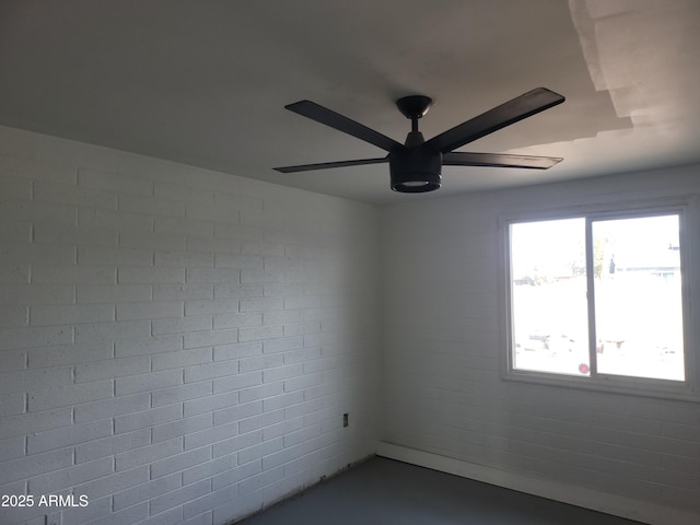 spare room featuring ceiling fan