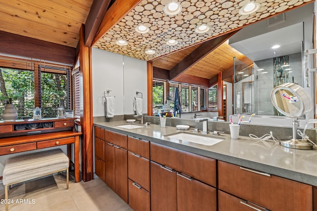 kitchen featuring wooden ceiling, light tile patterned flooring, sink, and vaulted ceiling with beams