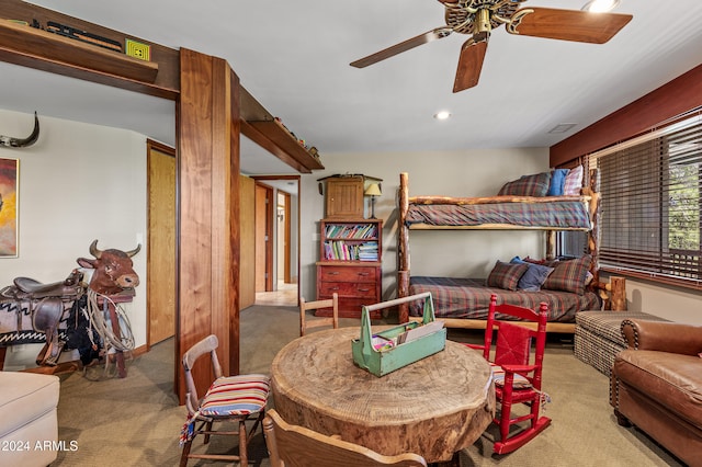 carpeted bedroom with ceiling fan