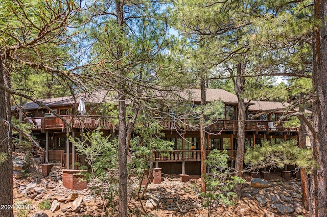 exterior space featuring a wooden deck