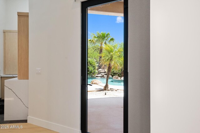 39419 N 7th Ave, Phoenix, AZ 85086 - entryway with baseboards and wood finished floors