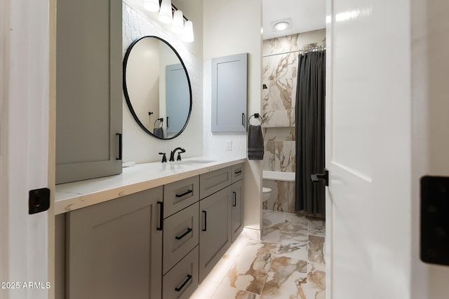 39419 N 7th Ave, Phoenix, AZ 85086 - bathroom featuring marble tiled flooring, vanity, and toilet