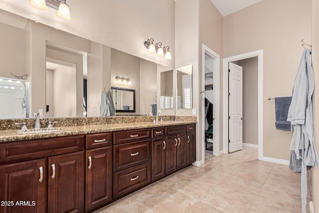 bathroom featuring tile patterned floors and vanity