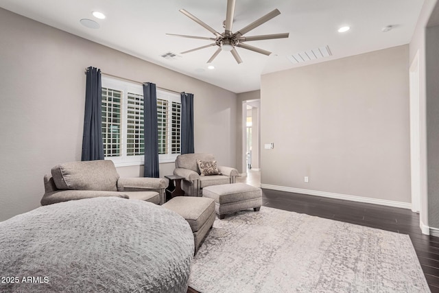 bedroom featuring dark hardwood / wood-style flooring and ceiling fan