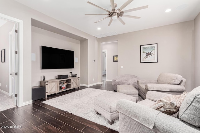 living room featuring ceiling fan