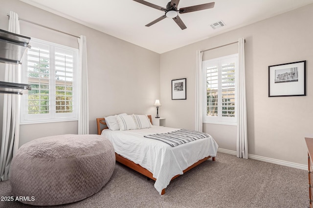 carpeted bedroom featuring ceiling fan