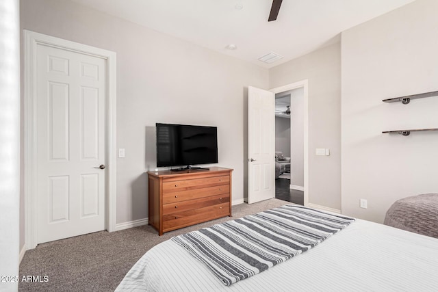 bedroom featuring ceiling fan and carpet