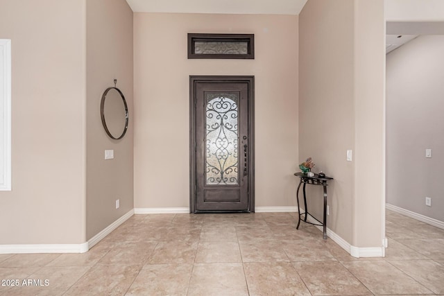 view of tiled foyer entrance