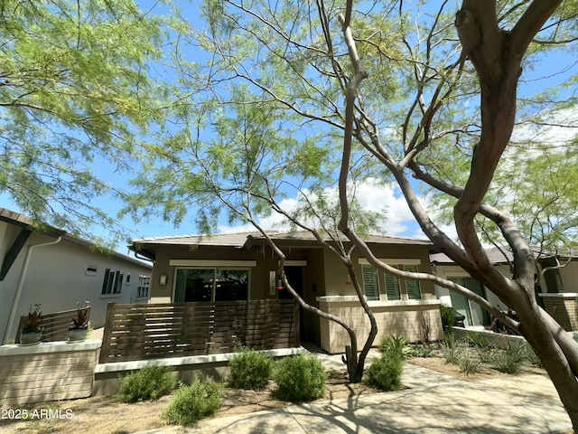 view of front of home with stucco siding