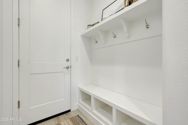 mudroom featuring light wood-style floors