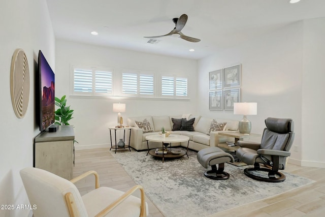 living room with ceiling fan, wood finished floors, visible vents, and recessed lighting