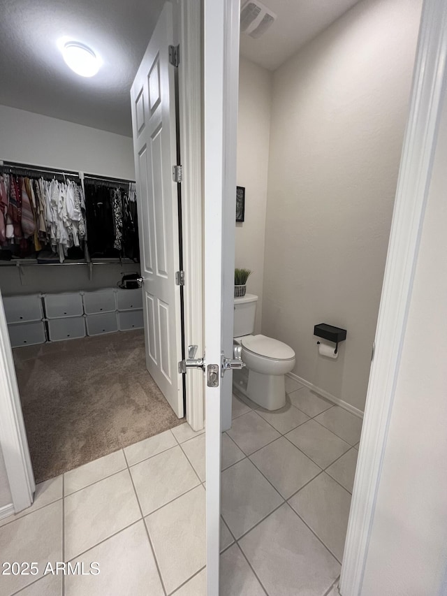 27636 W Runion Dr, Buckeye, AZ 85396 - bathroom featuring tile patterned flooring and toilet