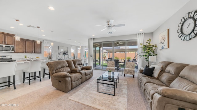 27636 W Runion Dr, Buckeye, AZ 85396 - living room featuring a ceiling fan, recessed lighting, and light tile patterned floors