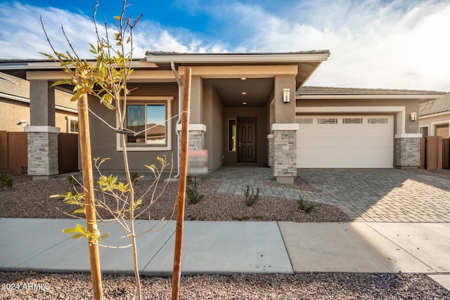 prairie-style house featuring a garage